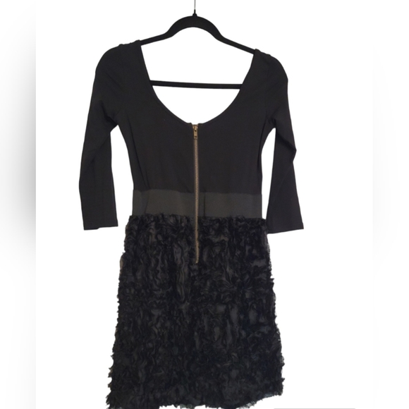 Petite small black mini dress with ruffle skirt. Only worn once. - Picture 2 of 2